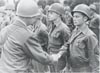 BISHIR, Robert E. receiving the Bronze Star in WW II